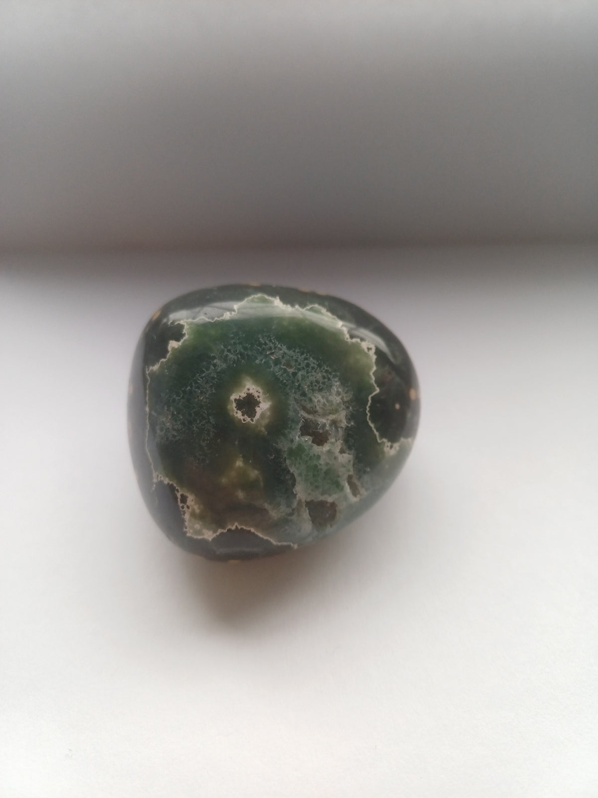 Ocean Jasper polished freeform base view showing circular orbicular patterns