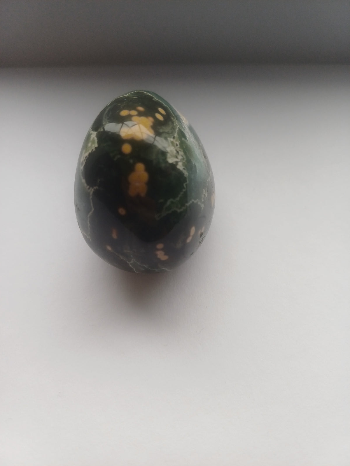 Ocean Jasper polished freeform upright view with mustard orb patterns